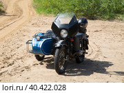 Syktyvkar, Komi Republic\Russia \ July 19, 2020\ An old motorcycle with a sidecar on the beach in summer in Sunny weather. Редакционное фото, фотограф Александр Поташев / Фотобанк Лори