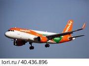 Airline EasyJet plane comes in for a landing in an aeroport El Prat city of Barcelona. Board number OE-IVT (2020 год). Редакционное фото, фотограф Яков Филимонов / Фотобанк Лори