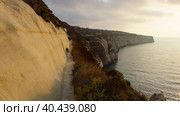 Закат на утесах залива Фомм ир-Рих. Мальта. (Sunset on the cliffs of Fomm ir-Rih Bay. Malta.) (2018 год). Стоковое фото, фотограф Igor Bakirov / Фотобанк Лори