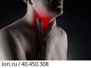 Sore throat, men with pain in neck on black background. Стоковое фото, фотограф Станислав Тарко / Фотобанк Лори