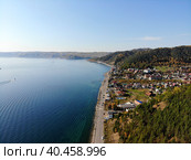 Listvyanka village, aerial view. Lake Baikal in autumn. Деревня Листвянка, вид с высоты птичьего полета. Озеро Байкал осенью. Стоковое фото, фотограф Виктория Тельминова / Фотобанк Лори