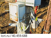 Junction box for connecting electrical wires. Attached to the lamppost. Стоковое фото, фотограф Юрий Поздников / Фотобанк Лори