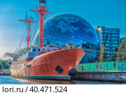 The floating ship "Irbensky" at dawn on the embankment of the historical fleet of the Museum of the World Ocean, Kaliningrad, Russia. Translation: "Irbensky". (2020 год). Редакционное фото, фотограф Анна Кривицкая / Фотобанк Лори