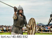 Russia, Staraya Ladoga 23,06,2012 Reenactors with shields and spears during the battle, the festival of historical reconstruction "Pages of History" Стоковое фото, фотограф Анна Кривицкая / Фотобанк Лори