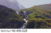 Tana glacier in North Ossetia, mountain waterfalls in the highlands. Стоковое видео, видеограф Юрий Поздников / Фотобанк Лори