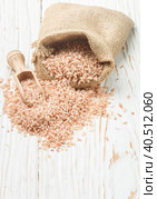Raw Organic Devzira Rice on a white table. Стоковое фото, фотограф Виктория Панченко / Фотобанк Лори