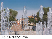 Light and music fountain on a spring morning. Natural Museum-reserve "Tsaritsyno". Fountain in Tsaritsyno Park. (2023 год). Редакционное фото, фотограф Photojuli / Фотобанк Лори
