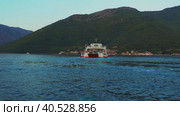 Boka Kotor Adriatic Sea, Verige Strait Kamenari Lepetane Ferry Line Trajekt. Ferryboat for passenger, cargo and vehicles. Tourism and business in Montenegro. Maritime transport coastal. August 16 2022. Стоковое видео, видеограф Юлия Петровская / Фотобанк Лори