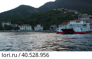 Boka Kotor Adriatic Sea, Verige Strait Kamenari Lepetane Ferry Line Trajekt. Ferryboat for passenger, cargo and vehicles. Tourism and business in Montenegro. Maritime transport coastal. August 16 2022. Стоковое видео, видеограф Юлия Петровская / Фотобанк Лори