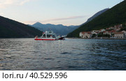 Boka Kotor Adriatic Sea, Verige Strait Kamenari Lepetane Ferry Line Trajekt. Ferryboat for passenger, cargo and vehicles. Tourism and business in Montenegro. Maritime transport coastal. August 16 2022. Стоковое видео, видеограф Юлия Петровская / Фотобанк Лори