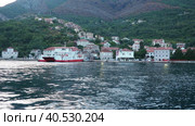 Boka Kotor Adriatic Sea, Verige Strait Kamenari Lepetane Ferry Line Trajekt. Ferryboat for passenger, cargo and vehicles. Tourism and business in Montenegro. Maritime transport coastal. August 16 2022. Стоковое видео, видеограф Юлия Петровская / Фотобанк Лори