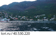 Boka Kotor Adriatic Sea, Verige Strait Kamenari Lepetane Ferry Line Trajekt. Ferryboat for passenger, cargo and vehicles. Tourism and business in Montenegro. Maritime transport coastal. August 16 2022. Стоковое видео, видеограф Юлия Петровская / Фотобанк Лори