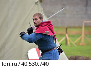 Festival of medieval reconstruction "Russian fortress", Fencing on swords in medieval costumes (2015 год). Редакционное фото, фотограф Анна Кривицкая / Фотобанк Лори
