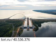 Two-line sluice near the town of Gorodets on the Gorky Reservoir, a transport artery on the Volga River near Nizhny Novgorod. Редакционное фото, фотограф Mikhail Starodubov / Фотобанк Лори