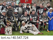 Knights in military uniforms at the Festival of the historical reconstruction of the Middle Ages "Vyborg Castle" (2014 год). Редакционное фото, фотограф Анна Кривицкая / Фотобанк Лори