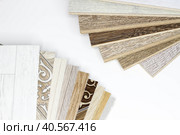 Laminate and linoleum. Choice between. Comparison of floor coverings. Стоковое фото, фотограф Алексей Круковский / Фотобанк Лори