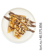 Belgian waffles with chocolate paste and nuts. Isolate, top view. Стоковое фото, фотограф Bogdanova Mariia / Фотобанк Лори