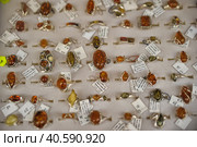 Estonia, Tallinn, 10,10,2014 Rings with amber for sale. Редакционное фото, фотограф Анна Кривицкая / Фотобанк Лори
