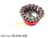 Metal cup brush, for cleaning surfaces from rust and paint, on a white background. The brush is a cup made of twisted wire. metal brush for a grinding machine on a white background. Стоковое фото, фотограф Александр Кротков / Фотобанк Лори