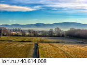 Scenic Tuscan landscape with beautiful fields, meadows and hills with morning fogs (2018 год). Стоковое фото, фотограф Анна Кривицкая / Фотобанк Лори