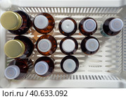 Herbal tinctures, antiseptics and other liquid medicines in vials. View from above. Medical background with medicines for pharmacies, hospitals, clinics. Стоковое фото, фотограф Бузмакова Светлана / Фотобанк Лори