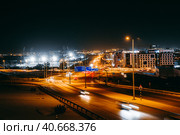View of night city of Muscat - capital of the Sultanate of Oman. Road junctions, road signs and houses illuminated at night. Стоковое фото, фотограф Евгений Ткачёв / Фотобанк Лори