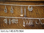 Jewelry with Slavic and Scandinavian symbols on sale. Стоковое фото, фотограф Анна Кривицкая / Фотобанк Лори