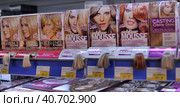 Russia, St. Petersburg 08,03,2014 Hair colors on the shelf in the supermarket. Редакционное фото, фотограф Анна Кривицкая / Фотобанк Лори