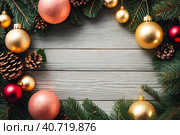 Christmas wreath with ornaments and pine cones on a wooden background with copy space for text or image. Generative AI. Стоковое AI-изображение, AI-художник Mixail59 / Фотобанк Лори