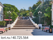 Part of the Sinop descent with a large clock. Stairs leading to the City Hill, landmark of thecity of Sevastopol, Russia. (2020 год). Редакционное фото, фотограф Ирина Кононова / Фотобанк Лори