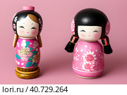 Kokeshi (Jap. 小芥子, variants: kokeshi or kokeshi) is a Japanese wooden doll covered with painting. Стоковое AI-изображение, AI-художник Сергей Елизарьев / Фотобанк Лори