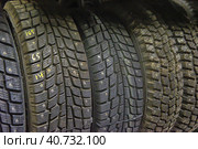 Winter studded tires in the shop. Стоковое фото, фотограф Анна Кривицкая / Фотобанк Лори
