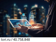 A person with a digital tablet and a hologram of modern buildings Illustration AI Generative. Стоковое AI-изображение, AI-художник Юлия Гапеенко / Фотобанк Лори