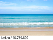 Seascape. Clear azure sea with sandy beach and blue sky on the horizon. Travel and tourism, sea recreation. Стоковое фото, фотограф Коханова Наталья / Фотобанк Лори