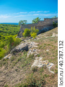 The remains of a medieval fortress city (according to other sources - a monastery) Tepe-Kermen, covering the upper part of the mountain in several tiers (2020 год). Стоковое фото, фотограф Анна Кривицкая / Фотобанк Лори