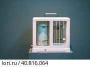 Seismological device for measuring earthquakes. Seismograph records an earthquake on the sheet of measuring paper. Earthquake wave on graph paper. Copyspace. Стоковое фото, фотограф Igor Tichonow / Фотобанк Лори