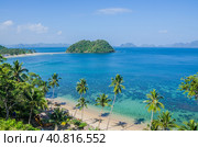 Tropical Beach with Palm trees. Many Islands in ocean in Background, El Nido, Palawan, Philippines (2014 год). Стоковое фото, фотограф Igor Tichonow / Фотобанк Лори