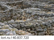 Ruins of stone buildings in the ancient city. Archaeological site. Ruins of the ancient city of Chersonesus. Historical sights of the Crimean peninsula. Sevastopol, Crimea. Редакционное фото, фотограф Андрей Степанов / Фотобанк Лори
