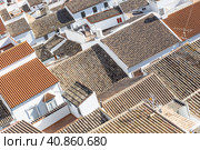 Aerial panoramic view of rooftops of white houses of Olvera town, considered the gate of white towns route in the province of Cadiz, Spain. Стоковое фото, фотограф Matej Kastelic / Фотобанк Лори