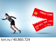 Businesswoman in credit card debt concept. Стоковое фото, фотограф Elnur / Фотобанк Лори