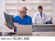 Two male doctors radiologists working in the clinic. Стоковое фото, фотограф Elnur / Фотобанк Лори