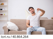 Young man starting day at home. Стоковое фото, фотограф Elnur / Фотобанк Лори