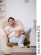 Young man starting day at home. Стоковое фото, фотограф Elnur / Фотобанк Лори