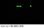 Wi-Fi router or modem light blinking. Wireless internet connection. Flashing green warning lights in black darkness. The process of transferring information through modern means of communication. Стоковое видео, видеограф Юлия Петровская / Фотобанк Лори