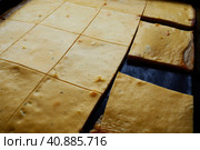 Razlevusha or razlevak, delicious Balkan pie or flatbread baked in the oven on a baking sheet of eggs, flour, cheese, sour cream or yogurt. Bosnian - Herceg - Serbian - Macedonian - Croatian recipe. Стоковое фото, фотограф Юлия Петровская / Фотобанк Лори