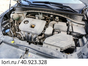 Engine of the Hyundai Tucson (2023 год). Редакционное фото, фотограф Art Konovalov / Фотобанк Лори