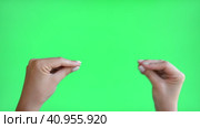 Hand argument. Couple conflict on Chroma key. Quarrel misunderstanding. Female finger mouth yelling accusing gesture at upset offended partner isolated on green screen free space background. Стоковое видео, видеограф Марина Демидюк / Фотобанк Лори