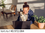 Young woman studying online on laptop at home. Стоковое фото, фотограф Гладских Татьяна / Фотобанк Лори