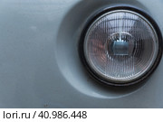 An old soviet union van`s front light and rusty hood. Fragment. Retro transportation concept. Передняя фара старого советского фургона и ржавый капот. Фрагмент. Концепция ретро-транспорта. Стоковое фото, фотограф Дмитрий Березнев / Фотобанк Лори