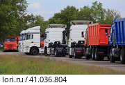 New trucks for sale. Стоковое фото, фотограф Юрий Бизгаймер / Фотобанк Лори